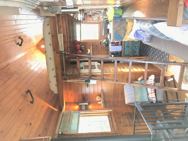 Living area with ladder to bed deck