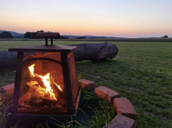 Communal Camp Fire at Twin Oaks Caravan & Camping